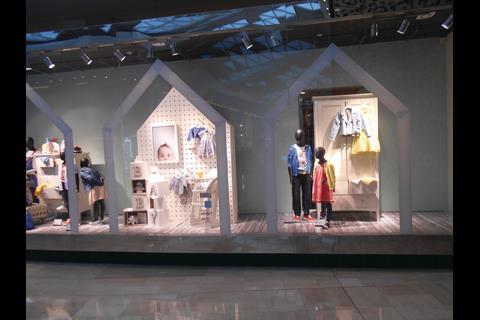 The clever part is the way in which the gable has been attached to the glassline, which is them mirrored by an illuminated backdrop that picks up on the theme.